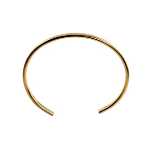 6 of 9: A handcrafted 3.5mm wide solid bronze cuff bracelet with a natural bark-textured finish, shown from a top-down view. The bracelet features a warm, golden-bronze tone and an open-ended design for easy wearing. Its slim and curved shape gives it a minimal yet earthy look, ideal for both men and women who appreciate artisanal, nature-inspired jewelry.