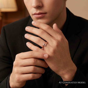 6 of 9: Man wearing a narrow copper bypass ring with bark texture while dressed in a black shirt and black jacket. His hands are held near his face, drawing attention to the warm copper tone and open wrap design in a softly lit indoor setting.  AI Generated Model.