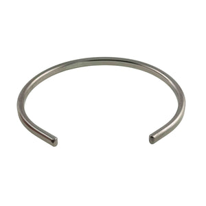 5 of 10: Front angled view of a slim 3.5mm brushed stainless steel cuff bracelet on a white background. The open cuff faces forward, clearly showing its curved shape, narrow matte silver tone band, rectangular profile, and smooth finished ends.