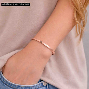 8 of 9: Close-up of a woman wearing a slim 3.5mm hand-hammered copper cuff bracelet on her wrist. The bracelet features a warm, polished copper finish with a lightly textured surface. Her hand is tucked into the pocket of light-wash denim jeans, and she is wearing a soft beige top. The overall look is casual and relaxed, highlighting the bracelet’s simple, handcrafted elegance.  AI Generated Model.