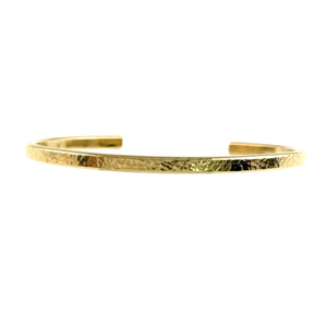 3 of 10: Slim hammered Nu Gold brass cuff bracelet shown against a clean white background, featuring a narrow 3.5mm width and open cuff design. The surface has a lightly textured, hand-hammered finish that reflects warm golden tones, with smooth rounded ends for comfortable wear and a minimalist, handcrafted look.