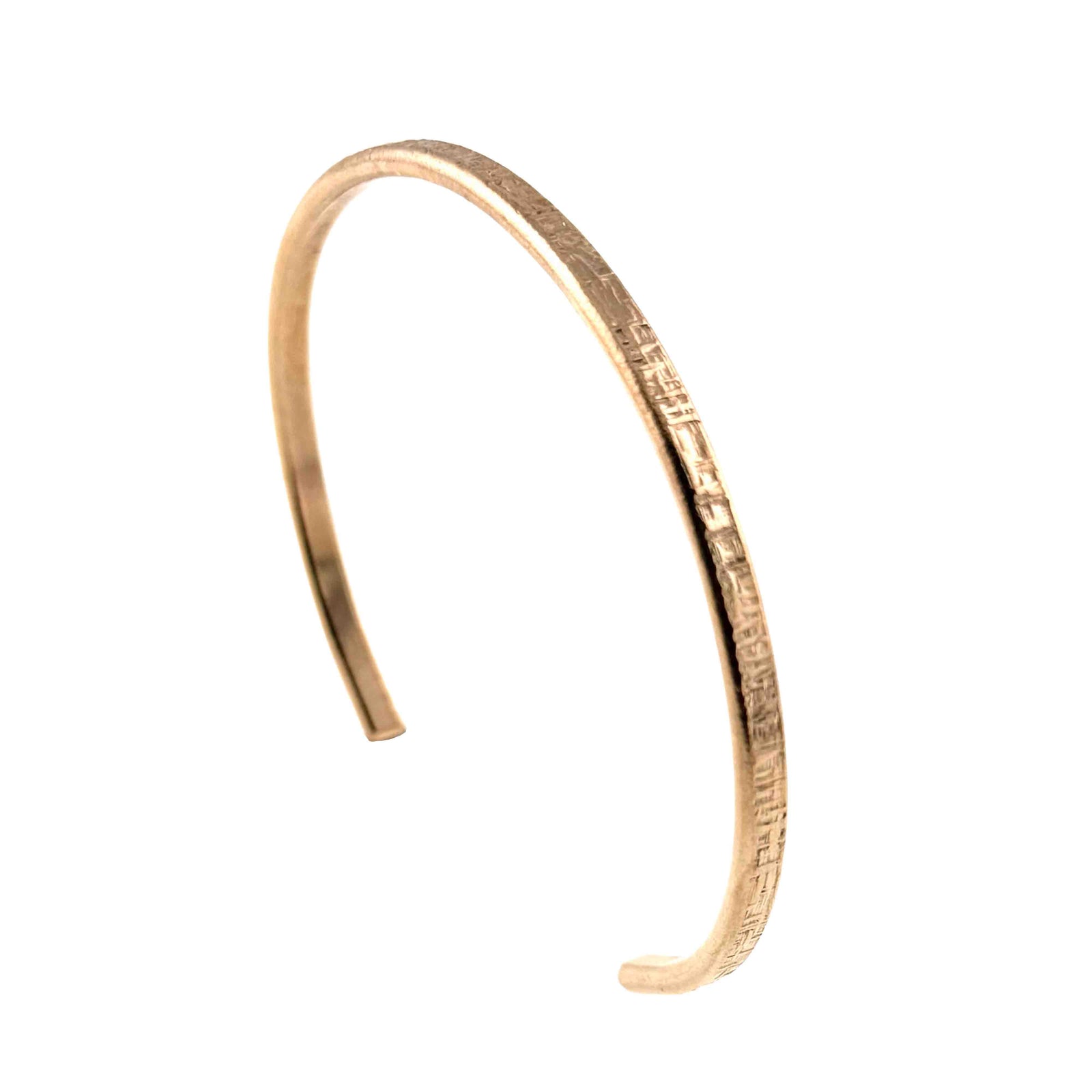 Handcrafted 3.5mm linen bronze cuff bracelet with a slim, open design and softly hammered texture. Warm golden bronze finish with subtle linear pattern, lightweight and minimalist, shown against a clean white background.