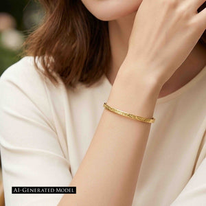 6 of 10: AI generated close up of a female model wearing the 3.5mm Linen Nu Gold Brass Cuff Bracelet. The slim handcrafted brass cuff showcases a polished finish with a subtle linen texture, highlighting its lightweight minimalist style and warm gold tone.