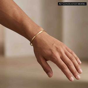 4 of 9: Man wearing a slim 3.5mm matte bronze cuff bracelet on his wrist. The handcrafted bronze cuff has a brushed satin finish and delicate minimalist style that pairs easily with casual and modern outfits. The warm bronze tone adds a soft glow against the skin.  AI Generated Model.