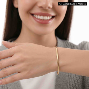 2 of 9: Close up of a smiling woman wearing a 3.5mm matte bronze cuff bracelet. The slim handcrafted bronze bracelet features a smooth brushed finish and minimalist open cuff design that adds subtle warmth and modern elegance to casual everyday outfits.  AI Generated Model.