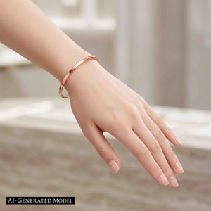 6 of 10: Slim matte copper cuff bracelet worn on a woman’s wrist, showing its delicate fit, warm copper tone, and simple everyday style against a soft neutral background.  AI Generated Model.