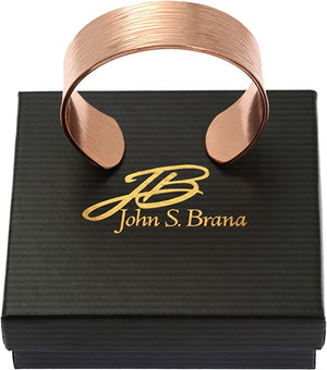 8 of 8: 3/4 Inch Wide Chased Copper Bark Cuff Bracelet on top of a Black Gift Box
