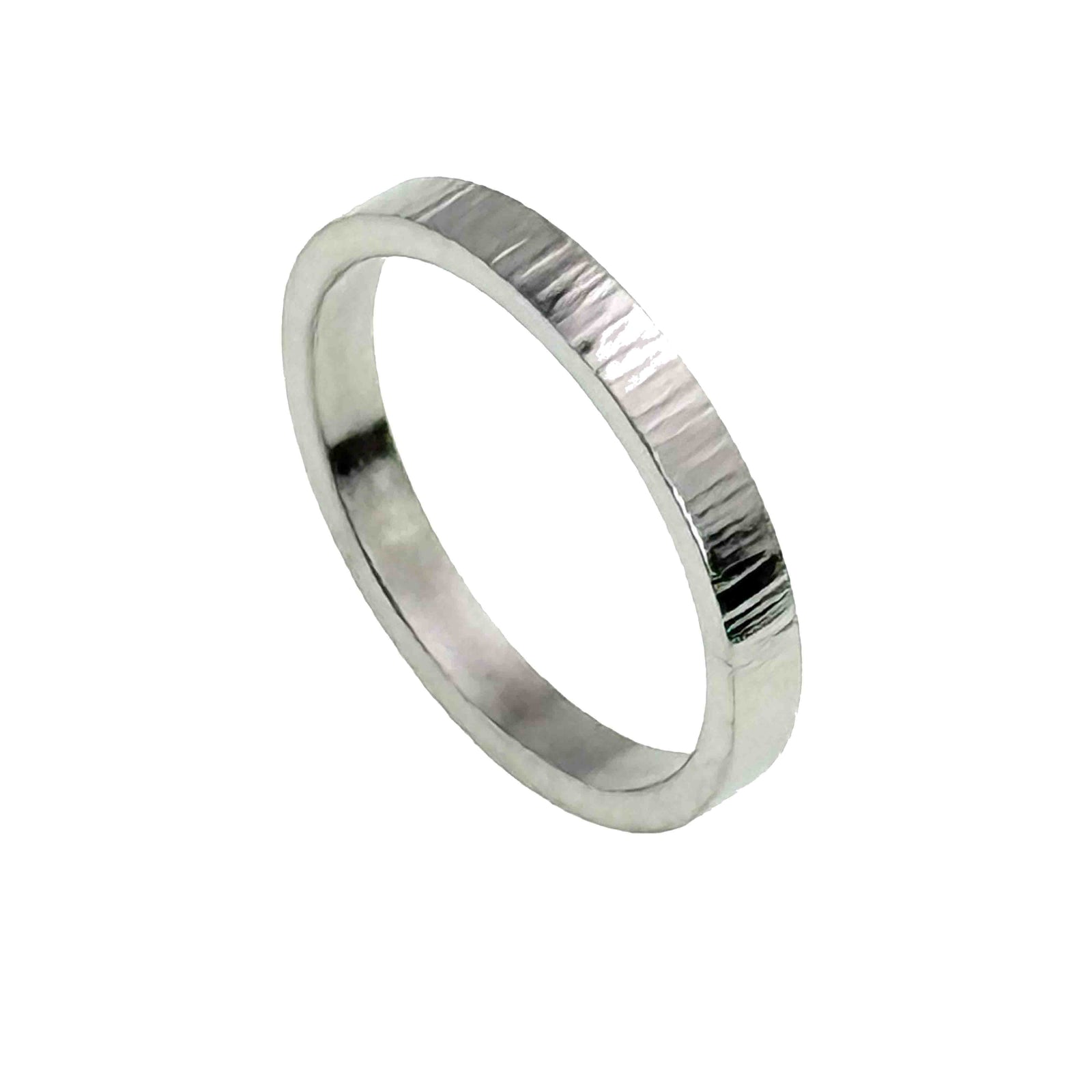 Handcrafted 3mm wide flat stainless steel ring with a vertical hand-chased texture and polished finish, designed in a minimalist unisex style.