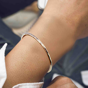 4 of 9: 3mm Wide Hammered Solid Bronze Cuff Bracelet on a Wrist 