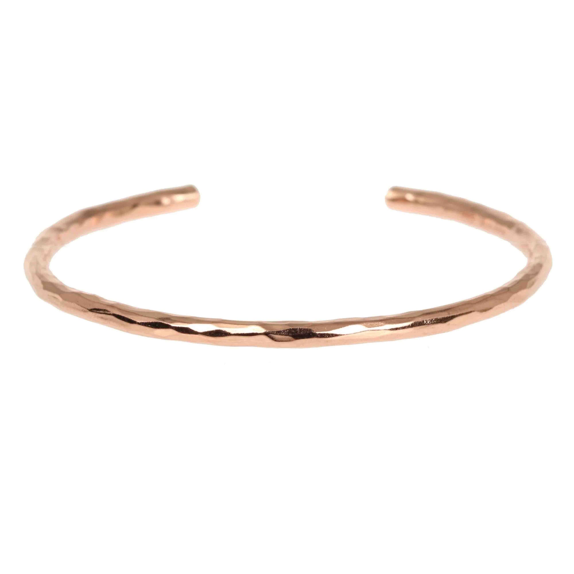 Detail of 3mm Wide Hammered Solid Copper Cuff Bracelet on a white background