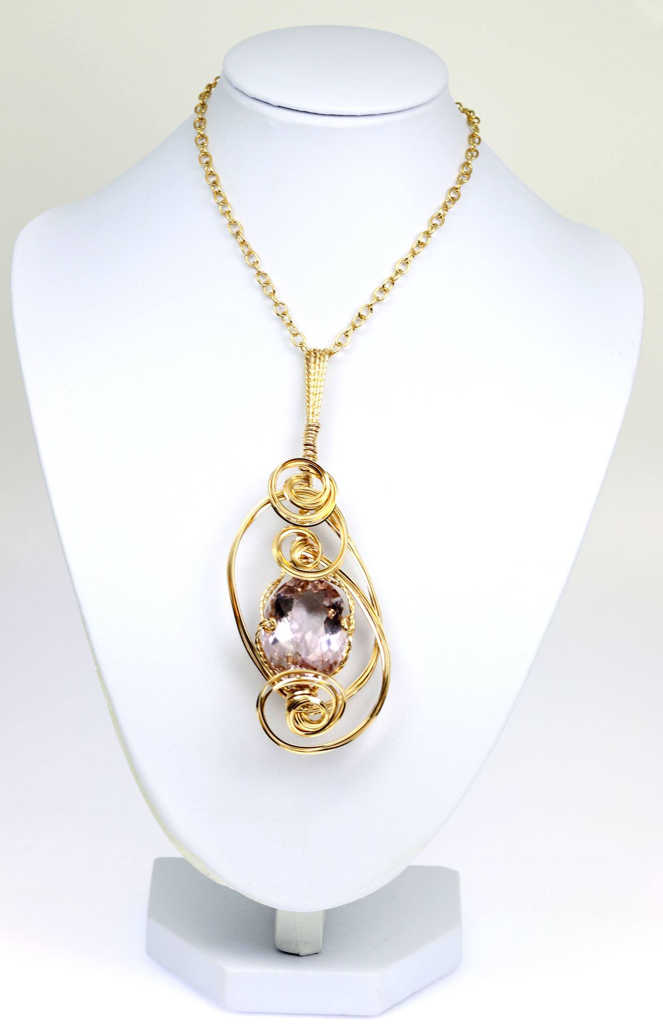 Cushion Cut Amethyst 14K Gold-filled Wire Wrapped Pendant with Chain on a White Neck Display