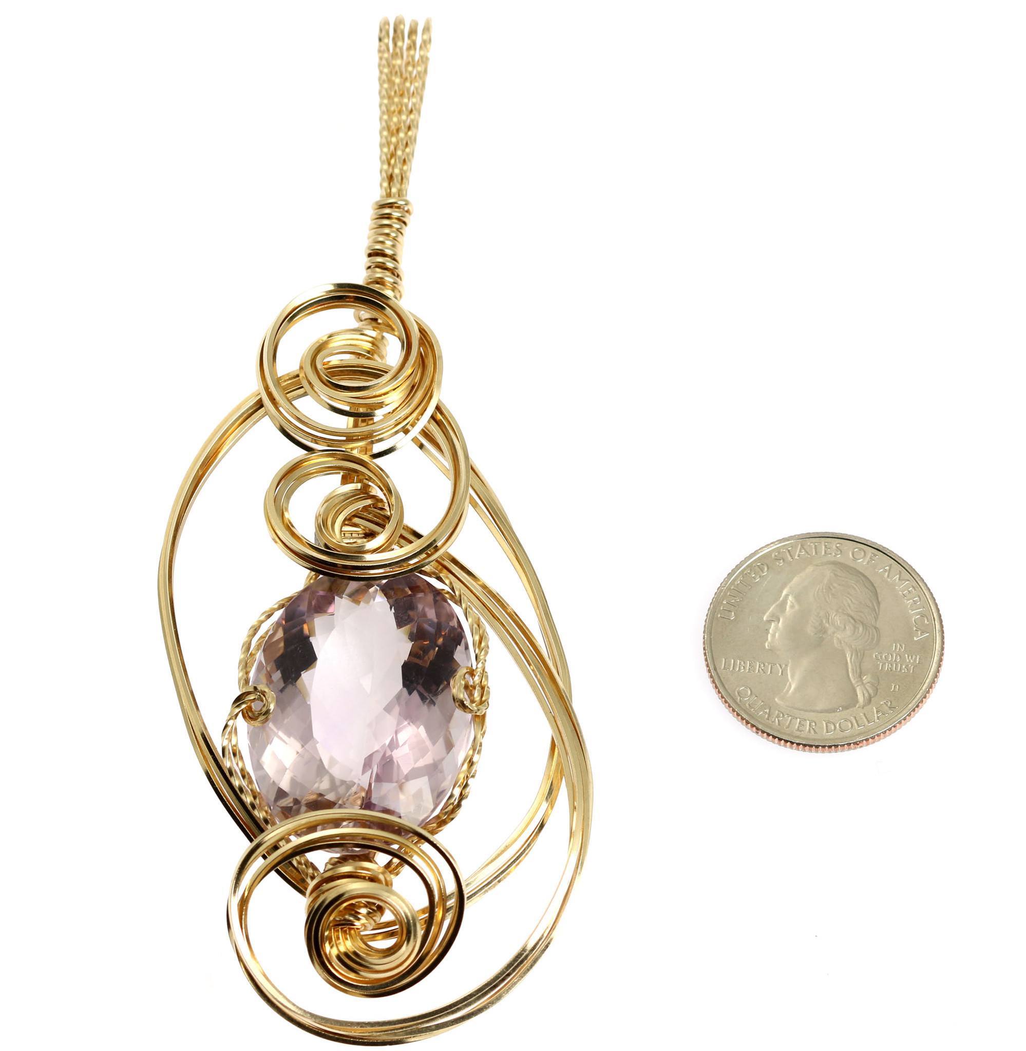 Size of Cushion Cut Amethyst 14K Gold-filled Wrapped Pendant compared to a US Quarter Coin