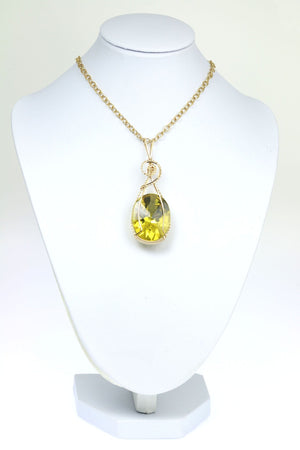 3 of 4: Oval Green Gold Quartz 14K Gold-filled Pendant with Chain on a White Neck Display