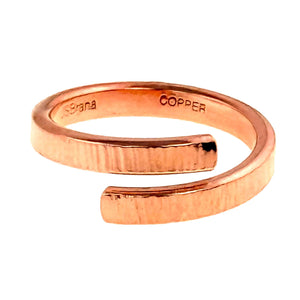 7 of 8: Top of 4mm Chased Copper Bypass Ring on a white background