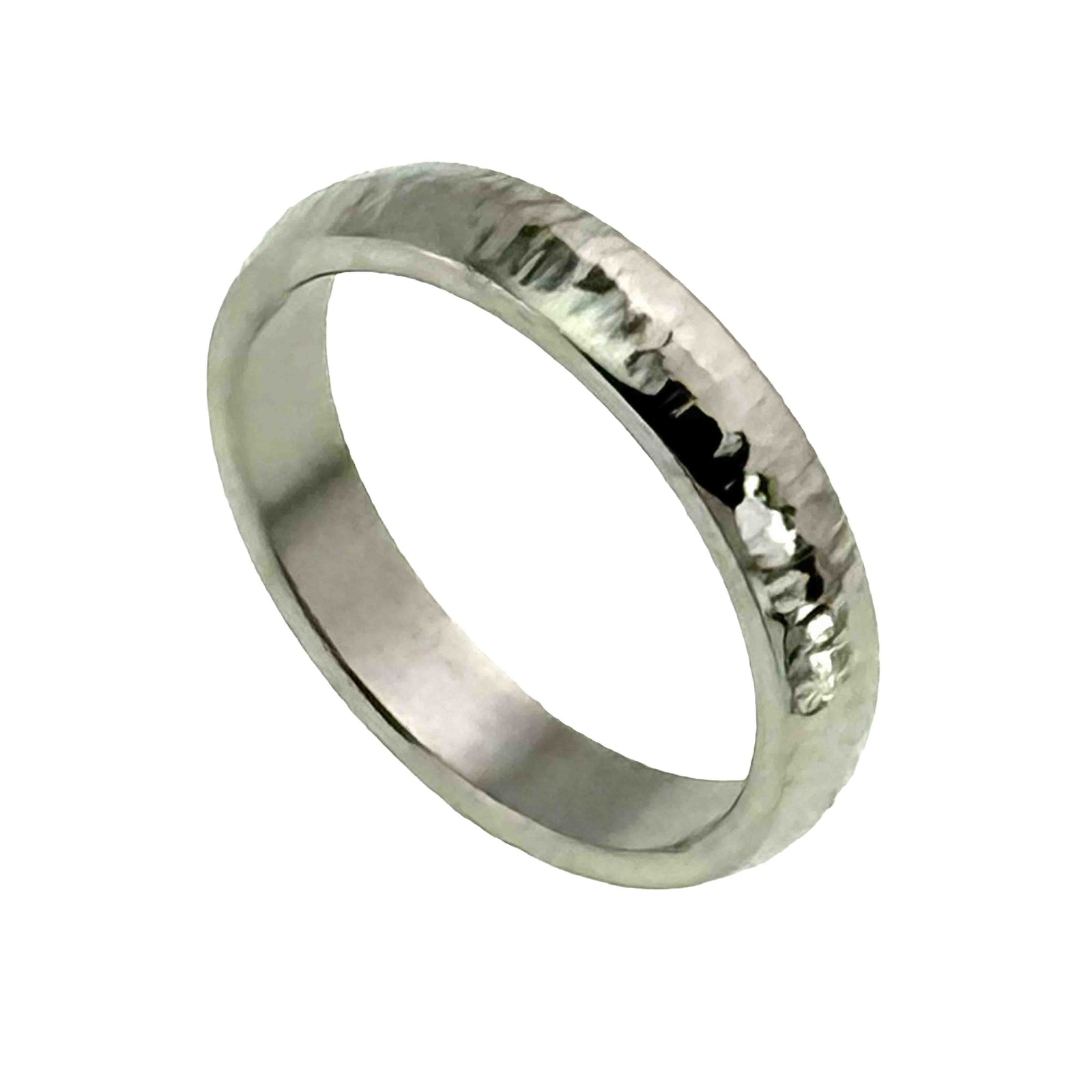 Angled three quarter view of a 4mm chased stainless steel domed ring on a white background. The polished silver band has a rounded outer profile, hand chased texture that catches the light, and a smooth flat interior designed for a comfortable fit.