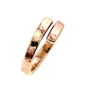 7 of 9: Polished 4mm hammered bronze bypass ring shown upright on a white background. The open overlapping ends and reflective hand worked texture are clearly visible.