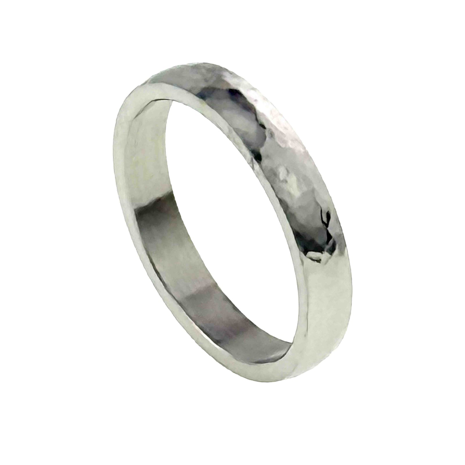 A 4mm hammered stainless steel domed ring is shown at a right facing angle on a white background. The view highlights the reflective hammered surface, smooth flat interior, rounded outer shape, and narrow polished edges.
