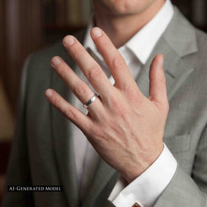 4 of 10: A close view shows a man in a light gray suit and white shirt holding up his left hand. A 4mm hammered stainless steel domed ring sits on his ring finger, where its polished surface reflects the soft indoor light. An AI generated model notice appears at the lower left.