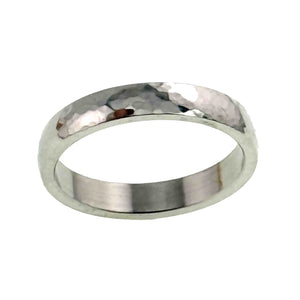 9 of 10: A 4mm hammered stainless steel domed ring is shown from a slightly raised front angle on a white background. The polished outer surface displays hand hammered marks, while the flat interior and slim 1.5mm thickness are clearly visible.