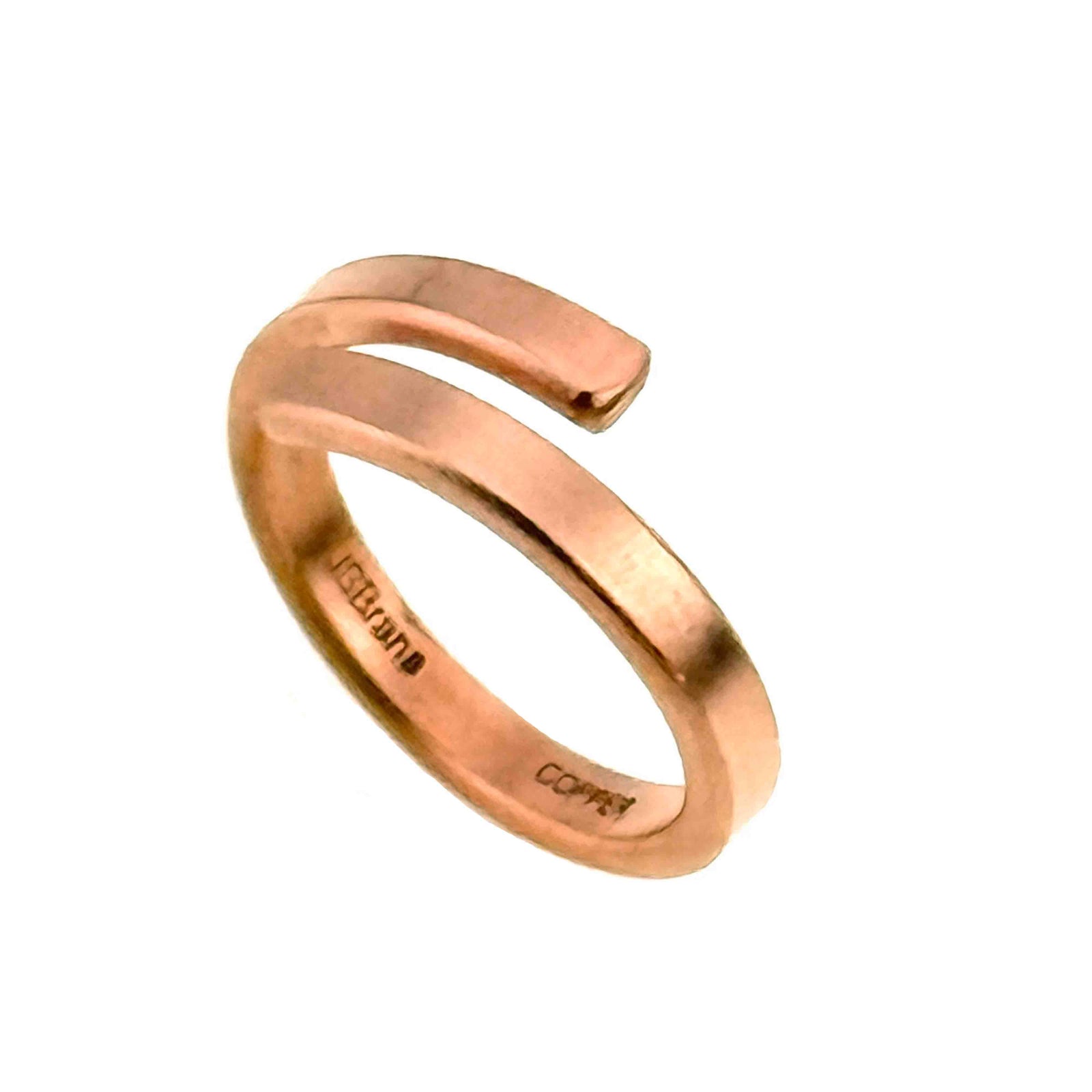 Studio product shot of the 4mm matte copper bypass ring on white background, displaying the brushed matte finish and open wrap design.