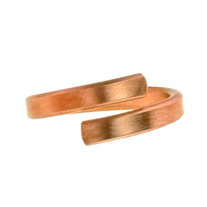3 of 9: Side view of the 4mm matte copper bypass ring showing the open bypass design and subtle texture of the hand-brushed finish.