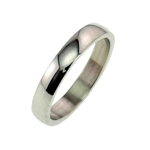 5 of 9: Three quarter view of a 4mm polished stainless steel domed ring standing at an angle on a white background. The bright mirror finish highlights the smooth rounded exterior and flat inner surface.