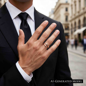 4 of 9: A man in a black suit, white shirt, and black tie displays the bronze bypass ring on his raised hand in an urban setting. The open ring and textured ends add a warm handmade accent to formal clothing.  AI Generated Model.