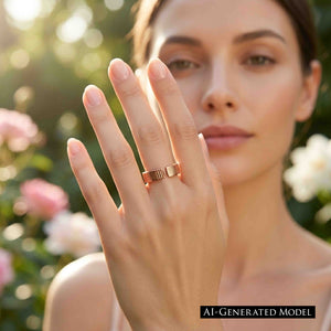 2 of 8: Outdoor lifestyle photo of a woman wearing a 5.5mm chased copper cuff ring. Her raised hand shows the open cuff shape and hand applied vertical texture against a softly blurred garden with flowers.  AI Generated Model.