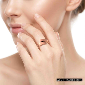 4 of 9: Woman wearing a matte copper bypass ring on her hand near her face, showing the soft brushed copper finish, open bypass band, and simple modern styling.  AI Generate Model.