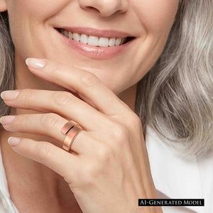 6 of 9: Woman wearing a matte copper bypass ring on her finger with a white blouse, showing the ring’s warm copper tone, clean open design, and modern everyday style.  AI Generated Model.
