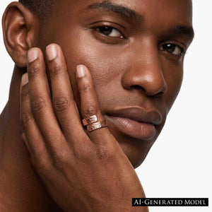 5 of 9: Close up of a man wearing a 5.5mm texturized copper bypass ring, highlighting the bold copper glow, hand chased texture, polished finish, and unisex bypass design on the finger.  AI Generated Model.
