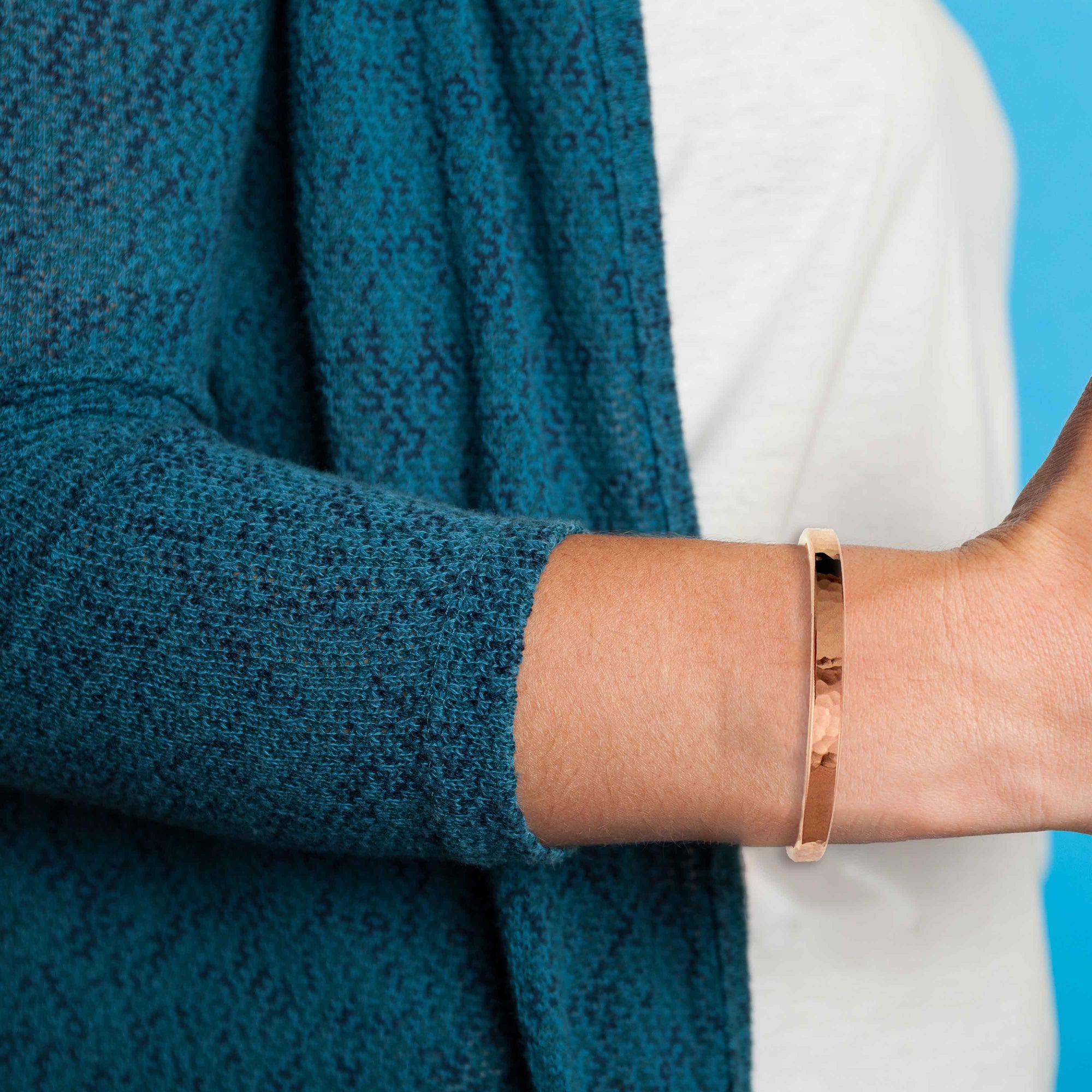 A 5mm Wide Hammered Copper Cuff Bracelet on a Woman's Wrist