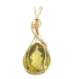 1 of 4: A 65 CT Green Gold Quartz 14K Gold-filled Pendant on a White Background