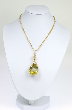 3 of 4: 65 CT Green Gold Quartz 14K Gold-filled Pendant with Chain on a White Neck Display