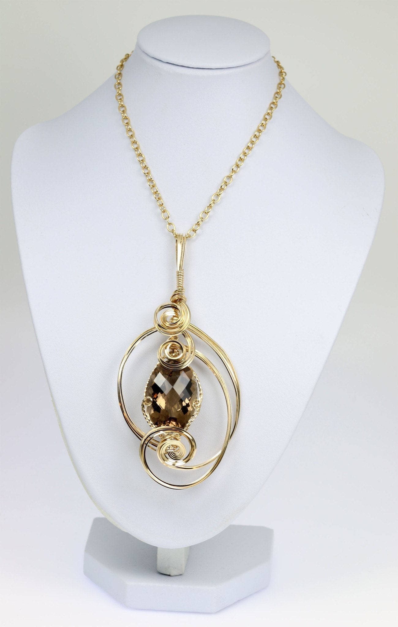 Smoky Quartz 14K Gold-filled Wire Wrapped Pendant with Chain on a White Neck Display