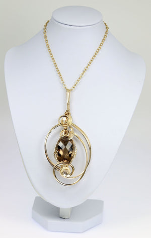 3 of 4: Smoky Quartz 14K Gold-filled Wire Wrapped Pendant with Chain on a White Neck Display