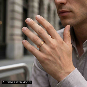 4 of 9: Man wearing a 6mm chased bronze cuff ring on his finger while holding his hand near his face in an urban setting. The polished bronze ring has an open cuff shape and a hand applied chased texture with narrow vertical marks.  AI Generated Model.
