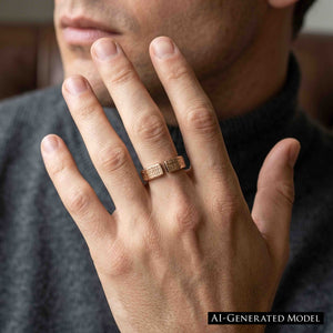 8 of 9: Unisex 6mm linen bronze cuff ring worn on a man’s finger, showing the open textured top, warm bronze color, modern handmade style, and casual everyday look with a dark sweater.  AI Generated Model.