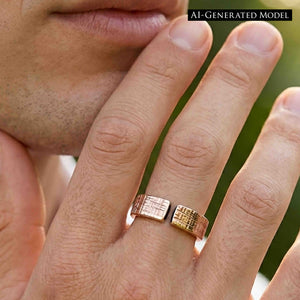 4 of 9: Close view of the 6mm linen bronze cuff ring worn on a man’s finger, showing the open front design, polished bronze shine, crosshatch linen texture, and comfortable unisex fit.  AI Generated Model.