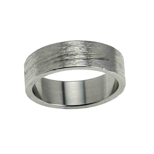 5 of 8: Front angled view of a 7mm wide stainless steel flat band ring with a hand carved bark texture on the exterior. The surface shows organic, tree bark inspired grooves with a polished finish that catches the light. The ring has flat outer edges and a smooth, reflective interior. Displayed against a clean white background, highlighting its modern unisex design and solid 2mm thickness.