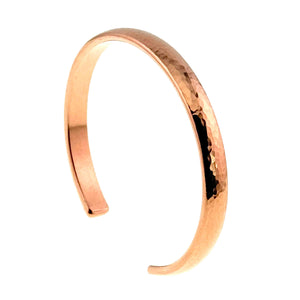 3 of 9: 7mm Domed Hammered Copper Cuff Bracelet on a white background - Right Side Detail