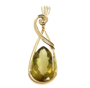 1 of 4: A 84.5 CT Green Gold Quartz 14K Gold-filled Wire Pendant on a White Background