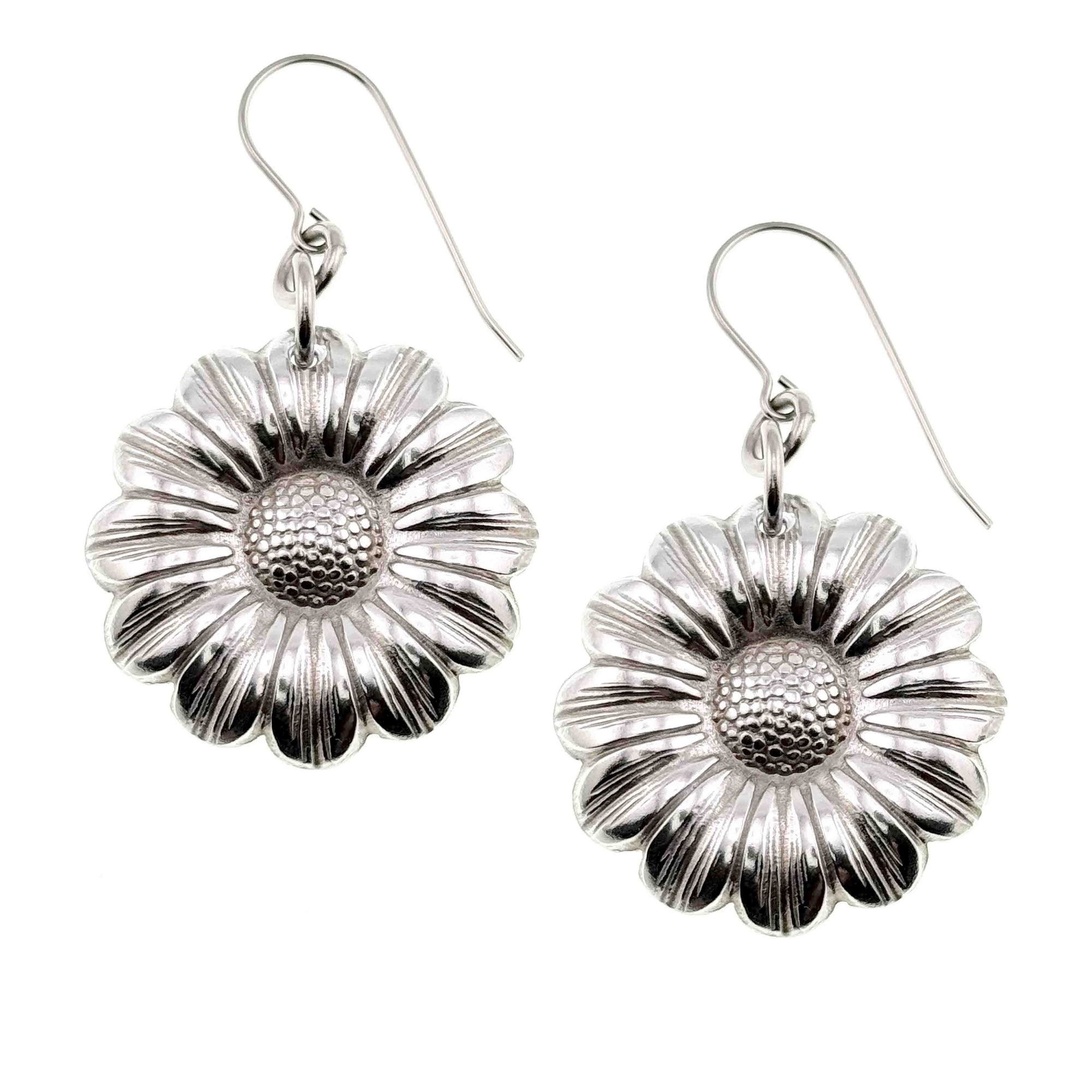 A Pair of Aluminum Daisy Disc Earrings  on a White Background