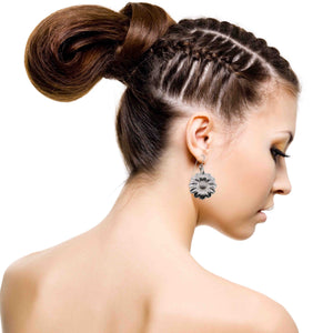 2 of 8: An Elegant Woman Wearing Aluminum Daisy Disc Earrings 