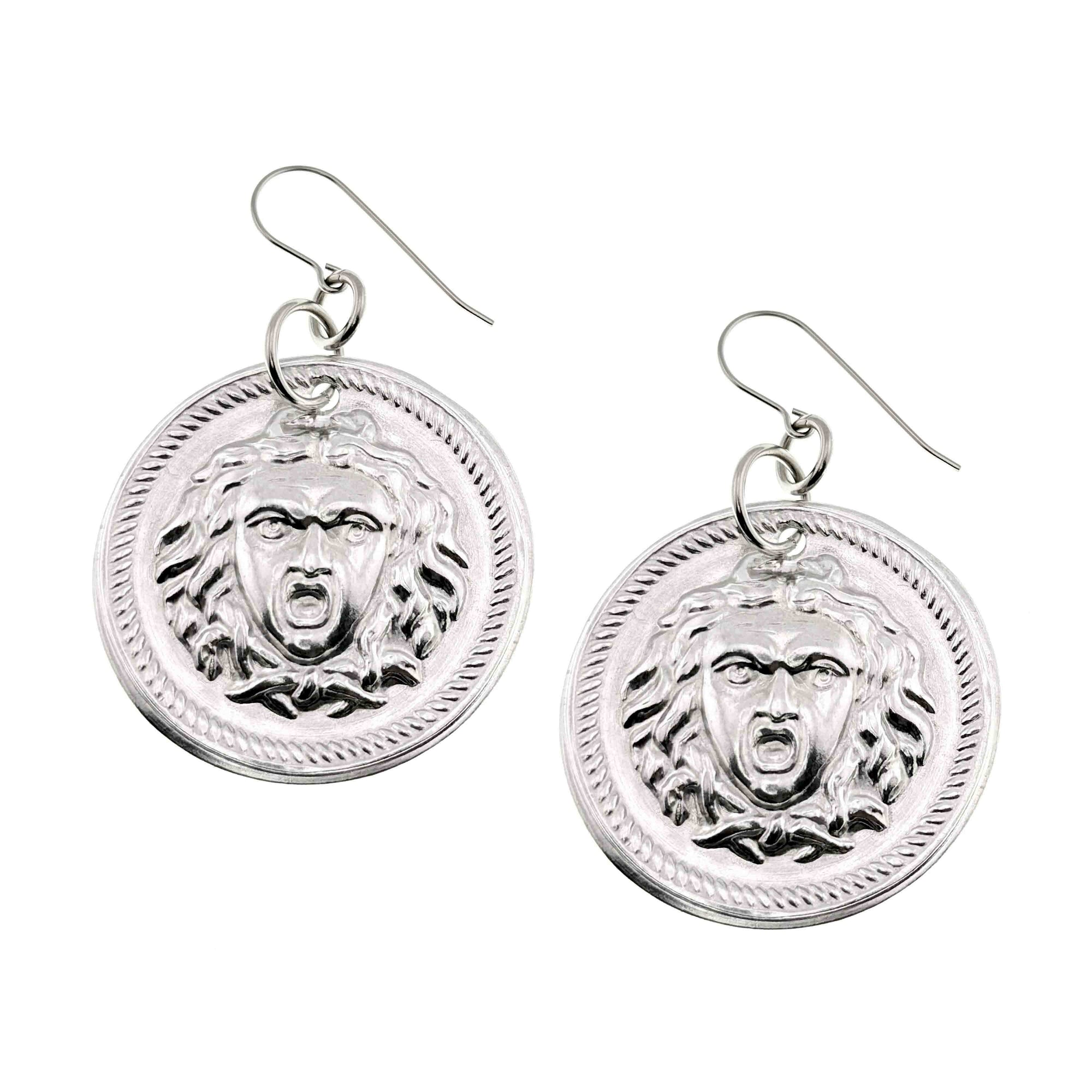 Aluminum Medusa Disc Drop Earrings on a white background