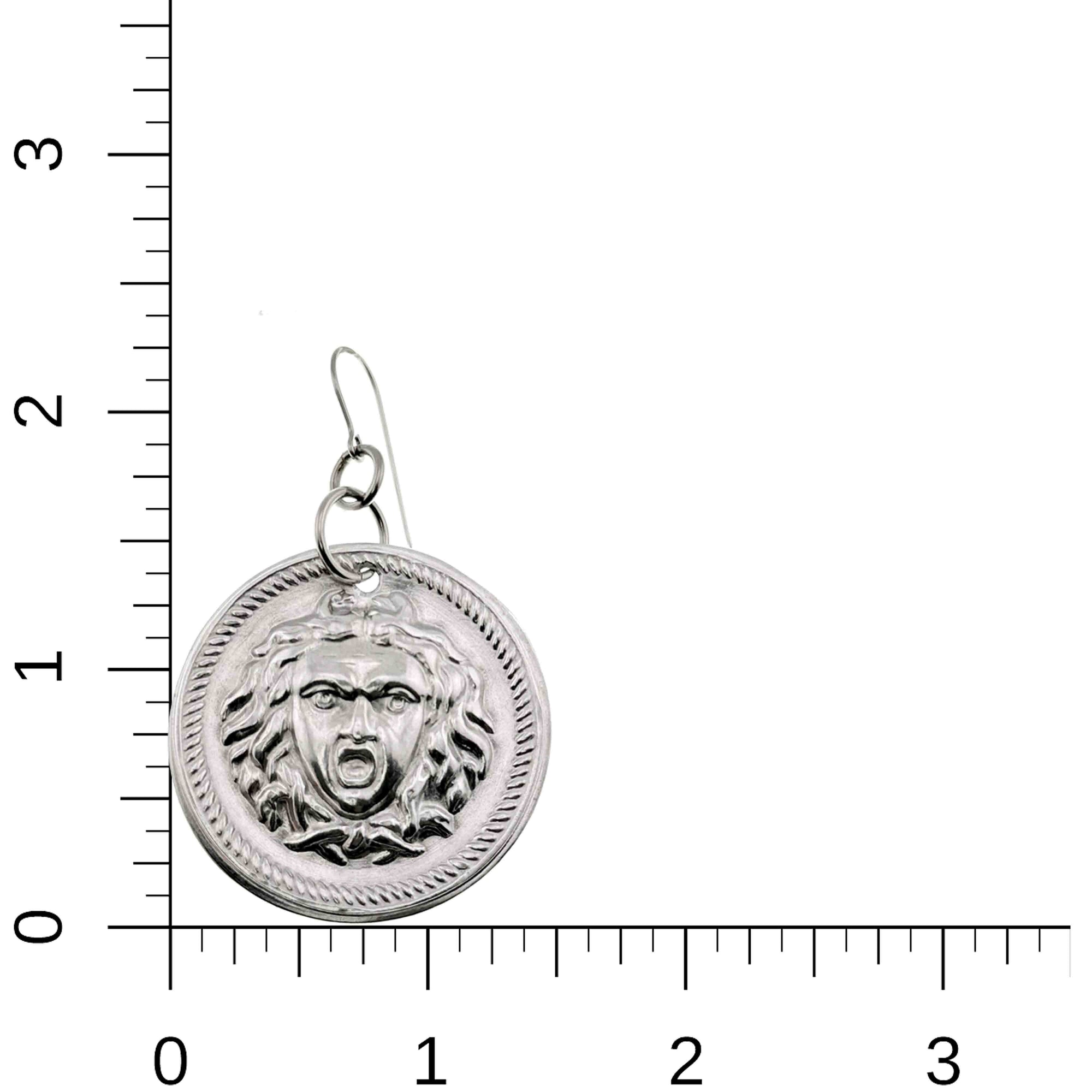 Aluminum Medusa Disc Drop Earrings on a white background with measurement scale