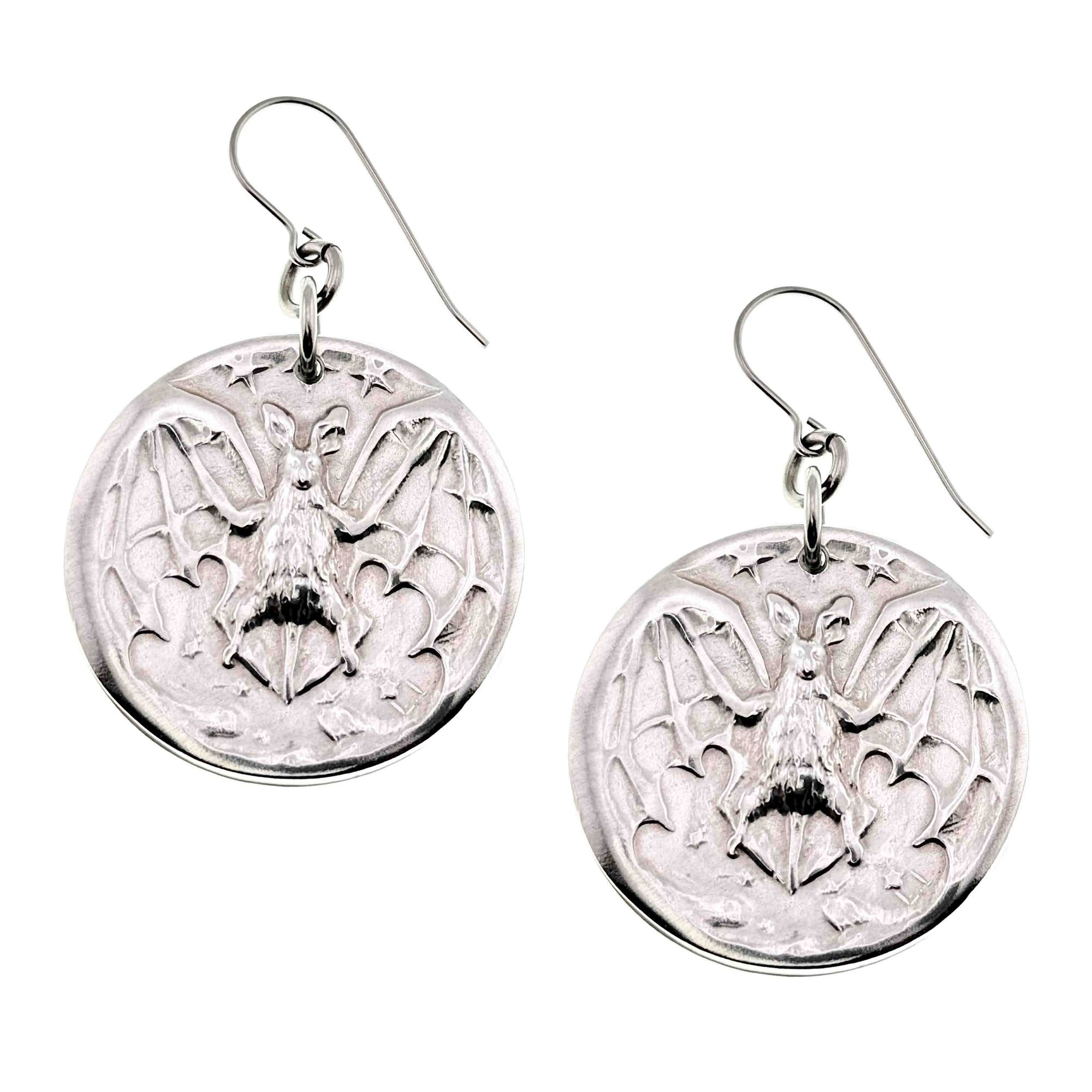 Aluminum Vampire Bat Disc Dangle Earrings with intricate designs on a white background