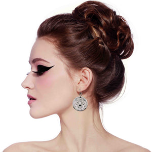 2 of 7: Woman with stylish hair and makeup on a white background wearing Aluminum Vampire Bat Disc Dangle Earrings