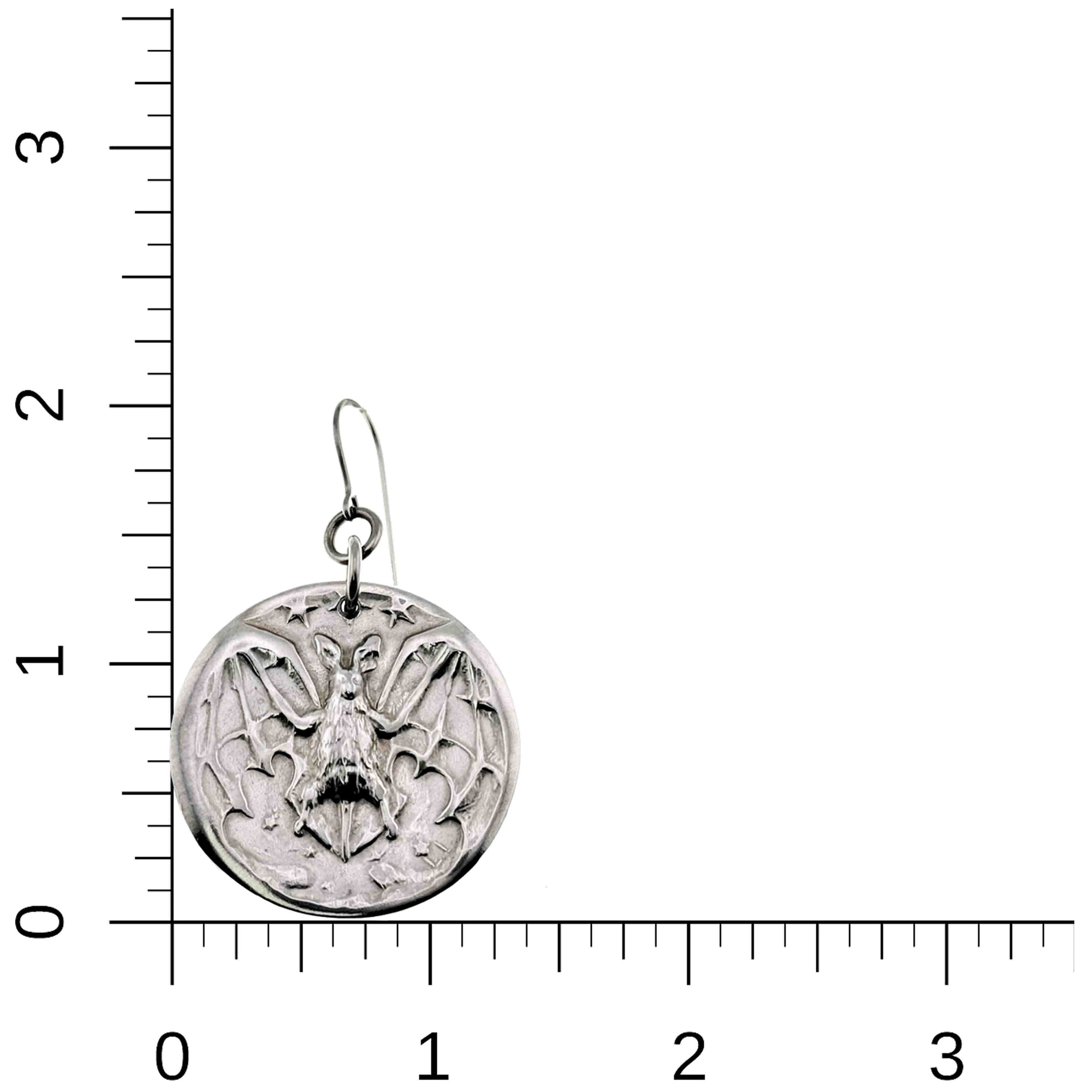 Aluminum Vampire Bat Disc Dangle Earring with intricate design on a white background with measurement scale