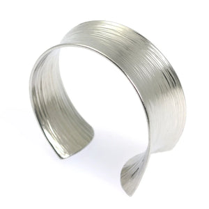 2 of 5: Right Side View of Tapered Bark Anticlastic Aluminum Bangle Bracelet